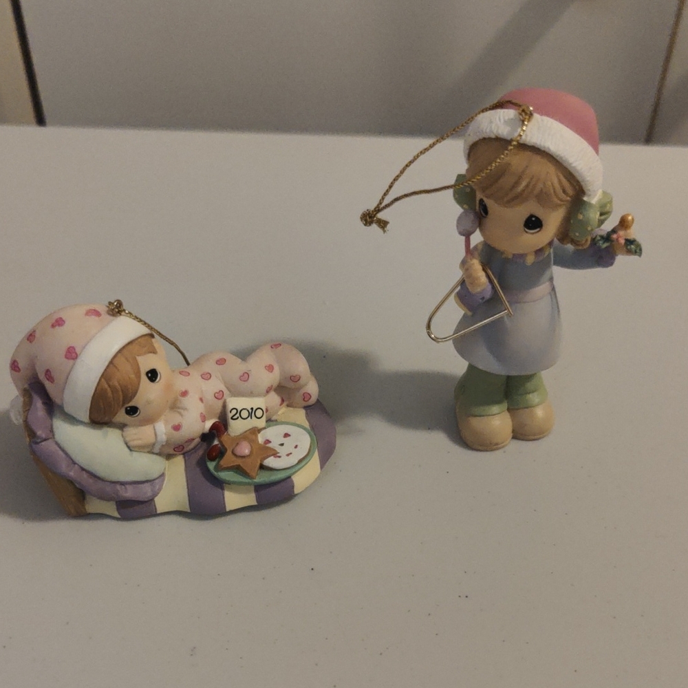 Precious Moments Pink and Purple Figurines